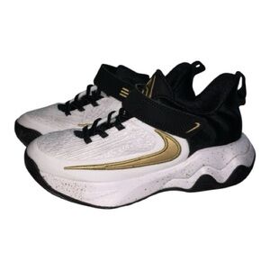 Nike Kids Sneakers in Black, White, and Gold Accents